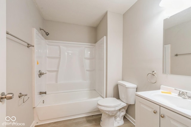 6570 N Private Road 525 E, North Vernon, IN 47265 - full bath featuring wood finished floors, vanity, and washtub / shower combination