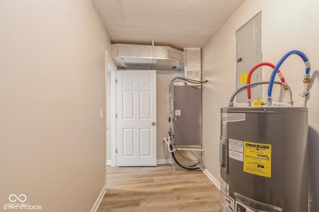 6570 N Private Road 525 E, North Vernon, IN 47265 - utility room featuring electric water heater and electric panel