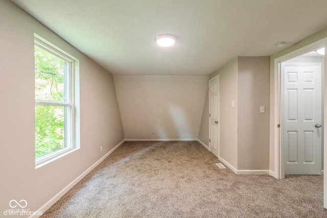 6570 N Private Road 525 E, North Vernon, IN 47265 - spare room with light colored carpet, plenty of natural light, and a smoke detector