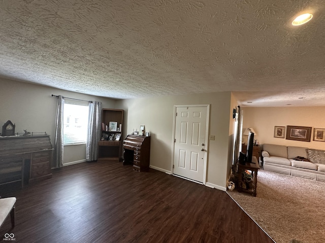 1001 Paradise Ct Unit F, Greenwood, IN 46143 - living room with dark wood-style flooring and a textured ceiling