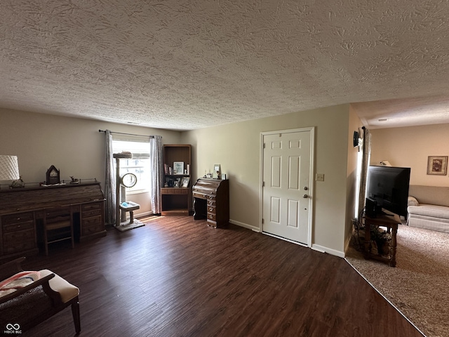 1001 Paradise Ct Unit F, Greenwood, IN 46143 - living area with a textured ceiling and dark wood-style floors