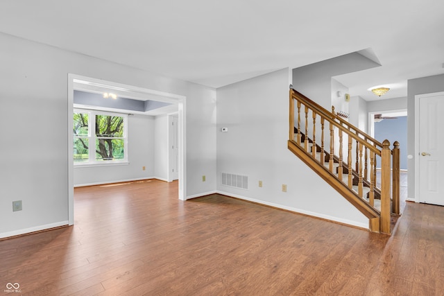 6329 Whitaker Farms Dr, Indianapolis, IN 46237 - empty room featuring stairway and wood finished floors