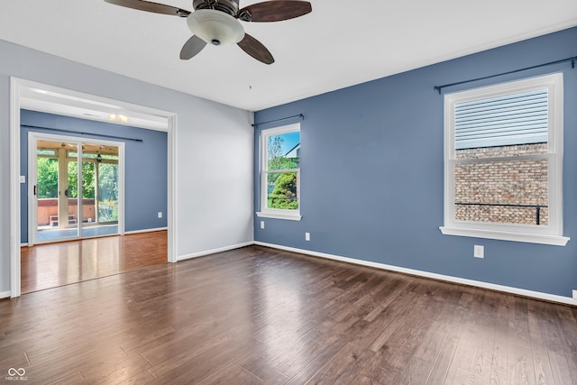 6329 Whitaker Farms Dr, Indianapolis, IN 46237 - spare room with dark wood-style floors and a ceiling fan