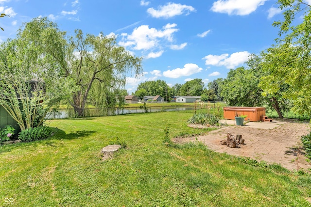 6329 Whitaker Farms Dr, Indianapolis, IN 46237 - fenced backyard featuring a hot tub, a water view, and a patio