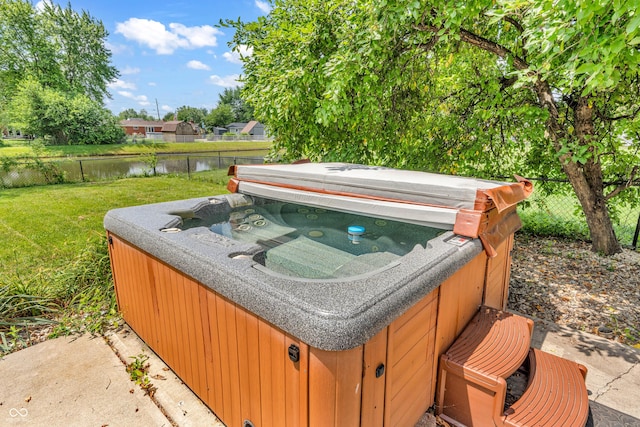 6329 Whitaker Farms Dr, Indianapolis, IN 46237 - view of yard featuring a hot tub and a water view