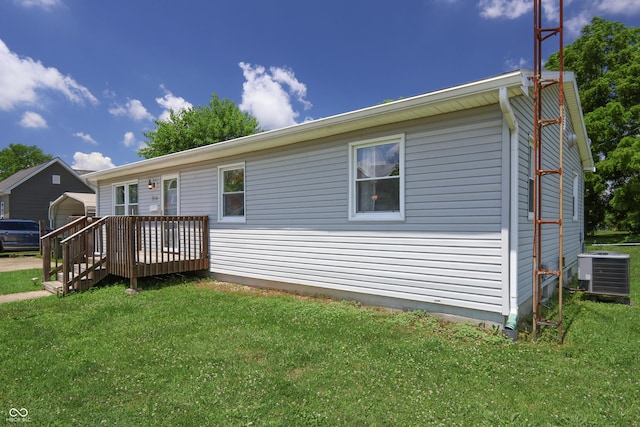 1014 Washington St, Hope, IN 47246 - back of property with a lawn and a deck