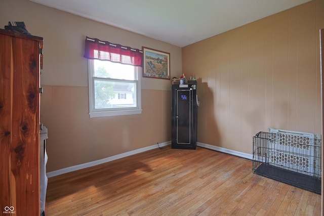 1014 Washington St, Hope, IN 47246 - empty room with hardwood / wood-style floors and baseboards