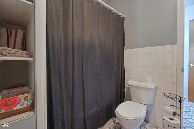 1014 Washington St, Hope, IN 47246 - bathroom featuring tile walls, a shower with curtain, and wainscoting