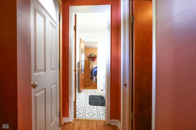 1014 Washington St, Hope, IN 47246 - corridor with light wood-style floors and a textured wall
