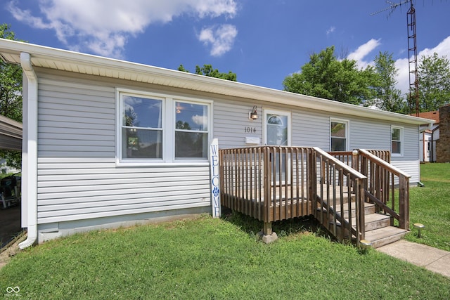 1014 Washington St, Hope, IN 47246 - view of front of property featuring a front lawn and a wooden deck