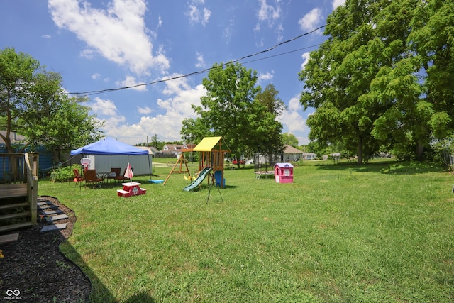 1014 Washington St, Hope, IN 47246 - view of grassy yard with a playground