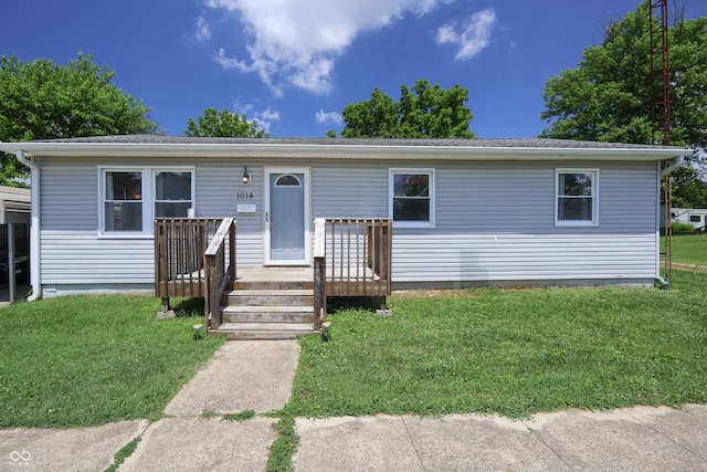 1014 Washington St, Hope, IN 47246 - view of front of house featuring a front lawn