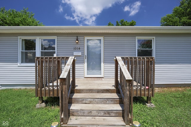 1014 Washington St, Hope, IN 47246 - doorway to property with a wooden deck