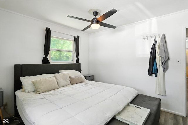 7307 Twin Beech Dr, Indianapolis, IN 46226 - bedroom featuring wood finished floors and a ceiling fan