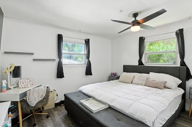 7307 Twin Beech Dr, Indianapolis, IN 46226 - bedroom with dark wood-style flooring and a ceiling fan