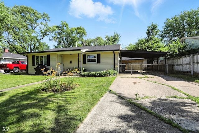 7307 Twin Beech Dr, Indianapolis, IN 46226 - view of front of home featuring concrete driveway and a carport