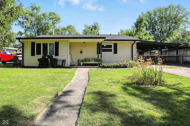 7307 Twin Beech Dr, Indianapolis, IN 46226 - view of front of house with an attached carport and driveway