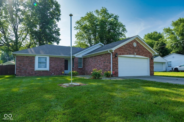 12113 N Rooker Rd, Mooresville, IN 46158 - ranch-style house with a garage, brick siding, and driveway