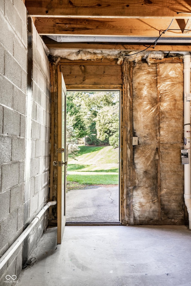 2247 Frisco Pl, Indianapolis, IN 46240 - doorway with unfinished concrete floors and concrete block wall