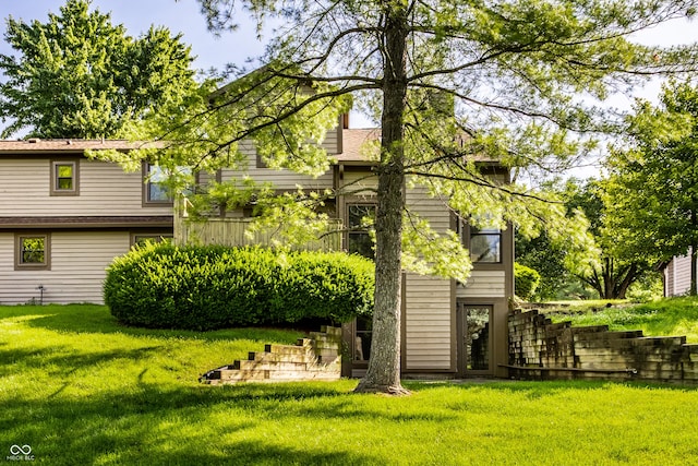 2247 Frisco Pl, Indianapolis, IN 46240 - rear view of property featuring a yard