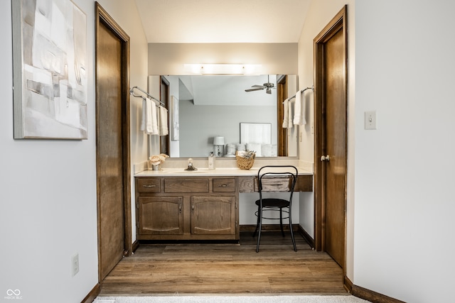 2247 Frisco Pl, Indianapolis, IN 46240 - bathroom with vanity, wood finished floors, and a ceiling fan