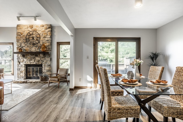 2247 Frisco Pl, Indianapolis, IN 46240 - dining room with wood finished floors and a stone fireplace