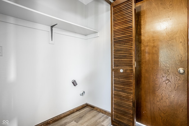 2247 Frisco Pl, Indianapolis, IN 46240 - laundry room featuring wood finished floors and baseboards