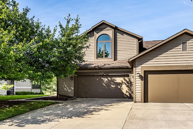 2247 Frisco Pl, Indianapolis, IN 46240 - view of front facade with driveway and a shingled roof