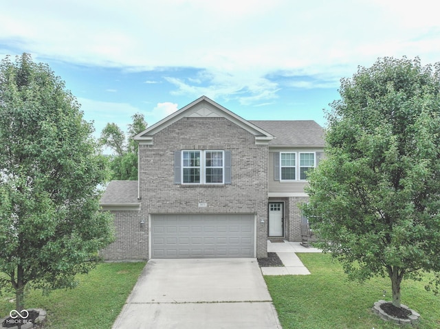 3075 W Crosscreek Dr, Monrovia, IN 46157 - traditional-style house with brick siding, driveway, a front lawn, an attached garage, and a shingled roof