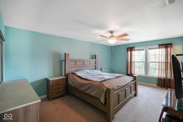 3075 W Crosscreek Dr, Monrovia, IN 46157 - bedroom with light colored carpet, a ceiling fan, and a textured ceiling