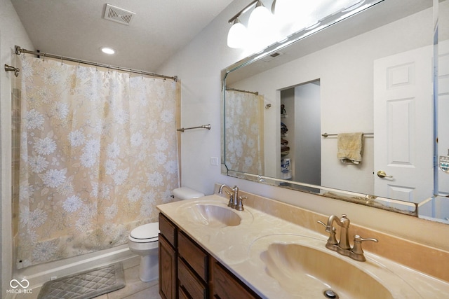 3075 W Crosscreek Dr, Monrovia, IN 46157 - full bathroom with double vanity, a shower with shower curtain, tile patterned floors, and recessed lighting