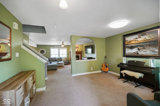3075 W Crosscreek Dr, Monrovia, IN 46157 - living area featuring ceiling fan, carpet, and a fireplace