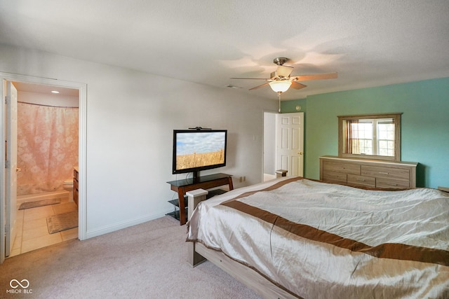 3075 W Crosscreek Dr, Monrovia, IN 46157 - carpeted bedroom with connected bathroom and a ceiling fan