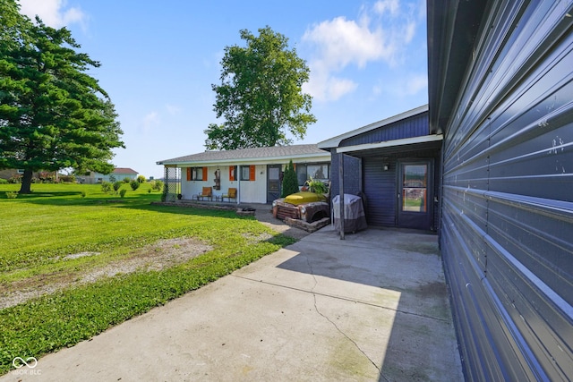 2911 N 200 W Rd, Franklin, IN 46131 - view of front of home with a front lawn and a patio area