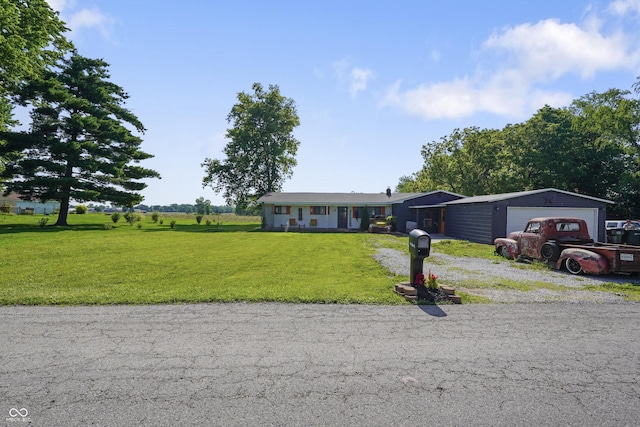 2911 N 200 W Rd, Franklin, IN 46131 - single story home featuring a front yard, a garage, and gravel driveway