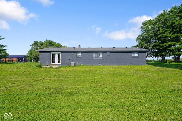 2911 N 200 W Rd, Franklin, IN 46131 - rear view of property with a yard, brick siding, and a chimney