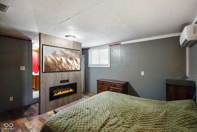 2911 N 200 W Rd, Franklin, IN 46131 - bedroom featuring a fireplace, wood finished floors, and a wall mounted air conditioner