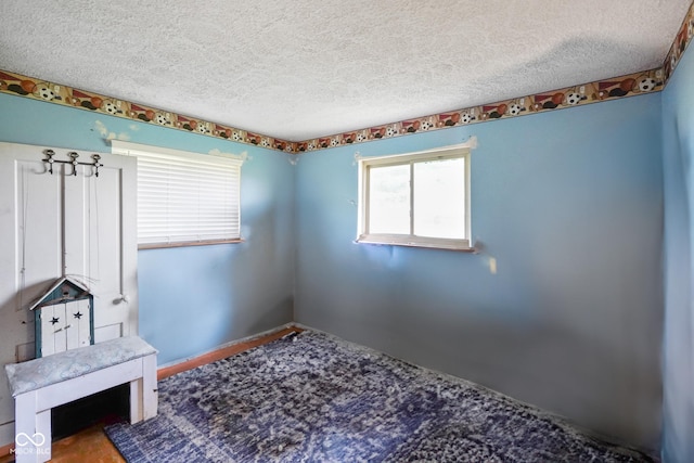 2911 N 200 W Rd, Franklin, IN 46131 - unfurnished bedroom with a textured ceiling