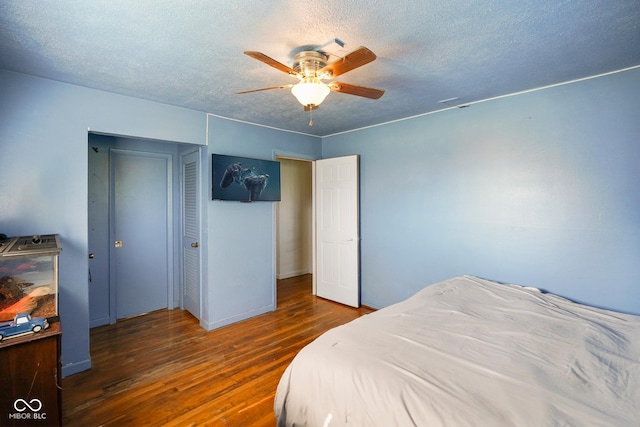 2911 N 200 W Rd, Franklin, IN 46131 - bedroom with hardwood / wood-style flooring, a textured ceiling, and ceiling fan