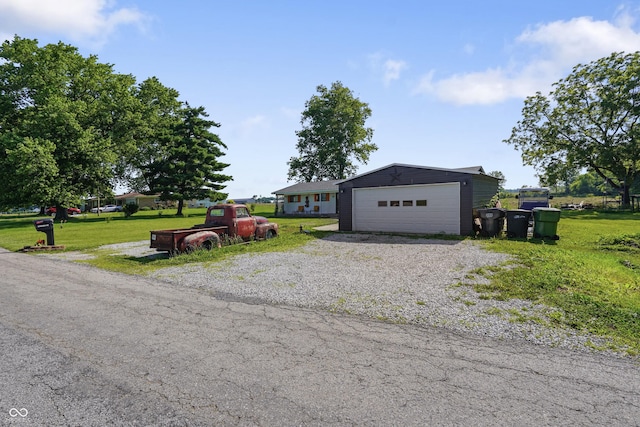 2911 N 200 W Rd, Franklin, IN 46131 - ranch-style house featuring a garage, a front lawn, and an outdoor structure