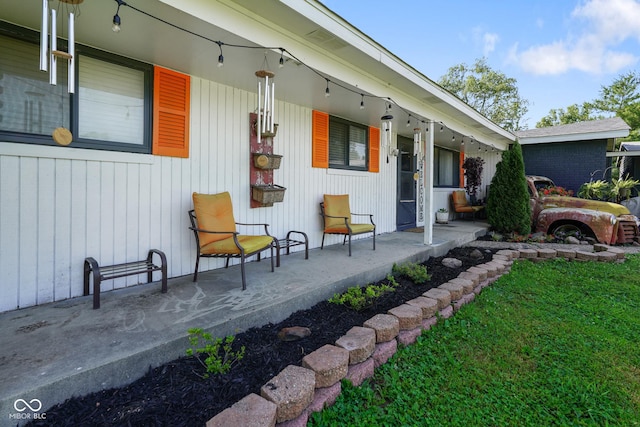 2911 N 200 W Rd, Franklin, IN 46131 - porch featuring a lawn