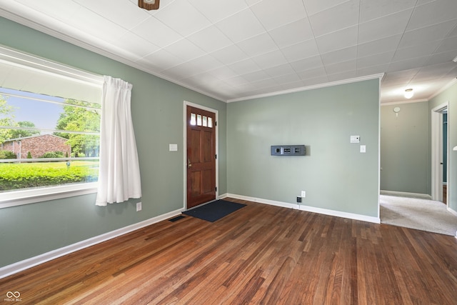 705 N Davidson St, Greensburg, IN 47240 - entrance foyer with ornamental molding and dark wood-type flooring