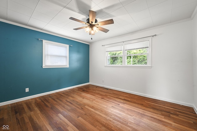 705 N Davidson St, Greensburg, IN 47240 - spare room with wood-type flooring, ceiling fan, and ornamental molding