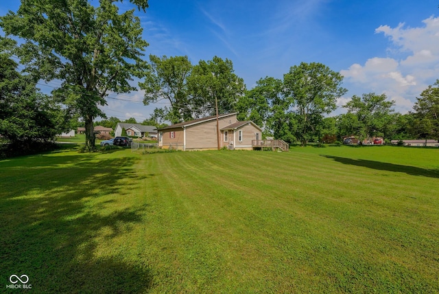 1905 W Brownstown Rd, North Vernon, IN 47265 - view of green lawn featuring a deck