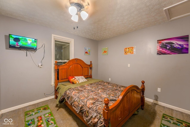 1905 W Brownstown Rd, North Vernon, IN 47265 - bedroom with carpet, a textured ceiling, and a ceiling fan