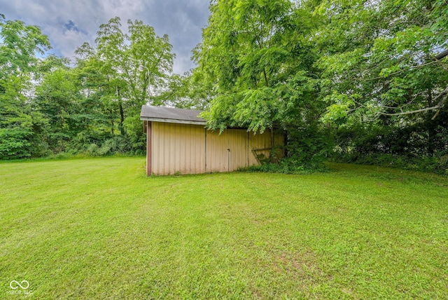 1905 W Brownstown Rd, North Vernon, IN 47265 - view of green lawn featuring a shed
