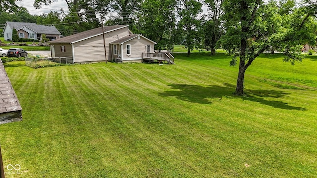 1905 W Brownstown Rd, North Vernon, IN 47265 - view of green lawn with a deck