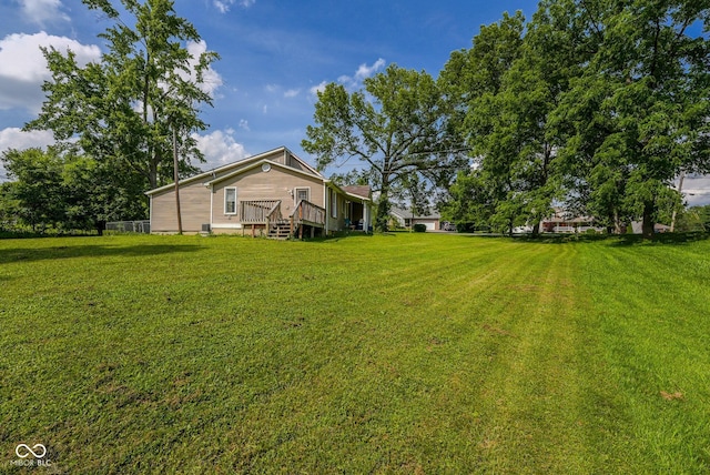1905 W Brownstown Rd, North Vernon, IN 47265 - view of grassy yard featuring a deck