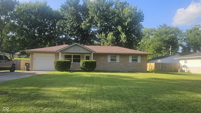 4614 Runyon Lake Dr W, Greenwood, IN 46143 - ranch-style house featuring asphalt driveway, a garage, and stone siding