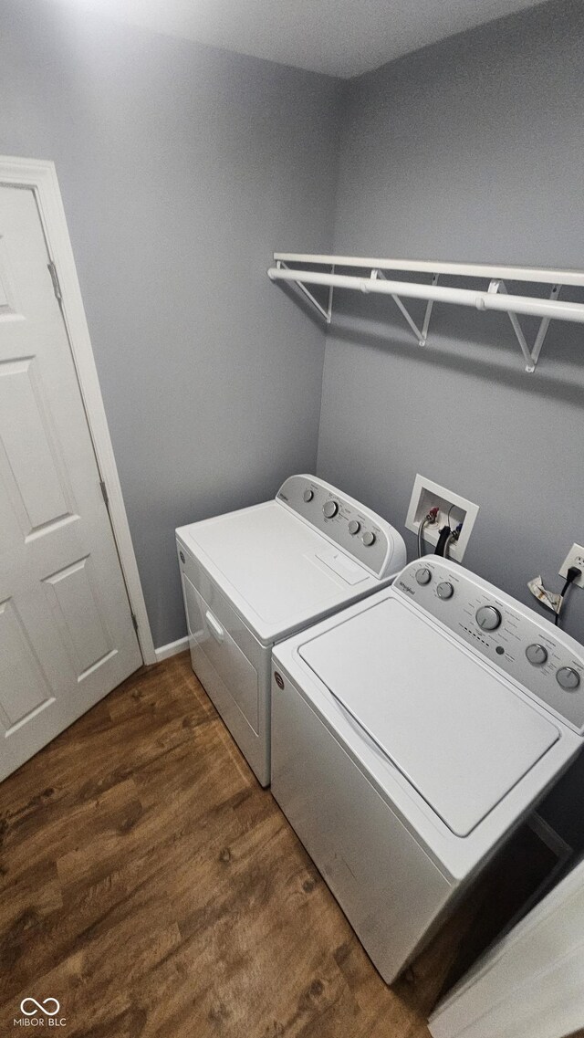 4614 Runyon Lake Dr W, Greenwood, IN 46143 - washroom featuring independent washer and dryer and dark wood finished floors